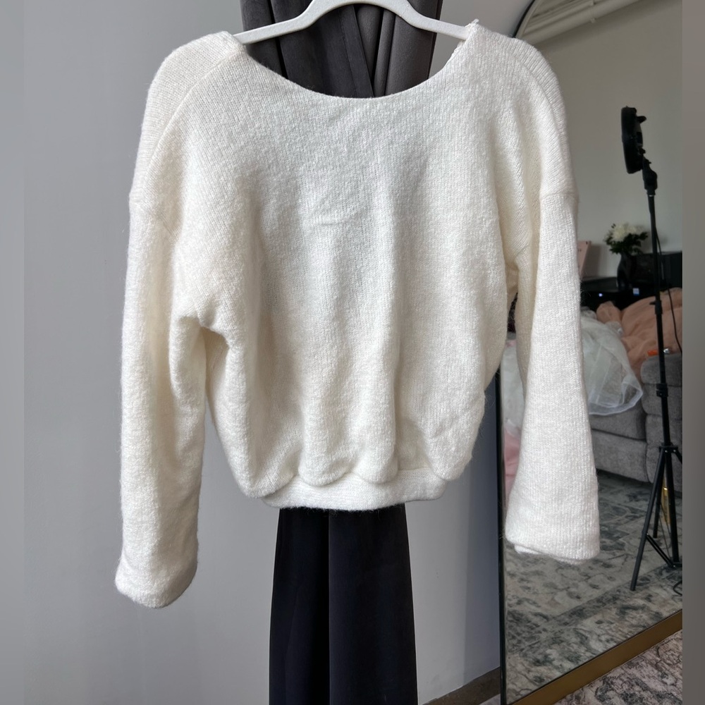Soft sweater with open laces back
